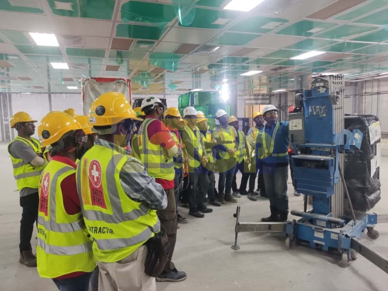 On-site MEWP training session for a group of construction contractors.